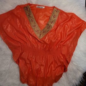 medium metallic orange top